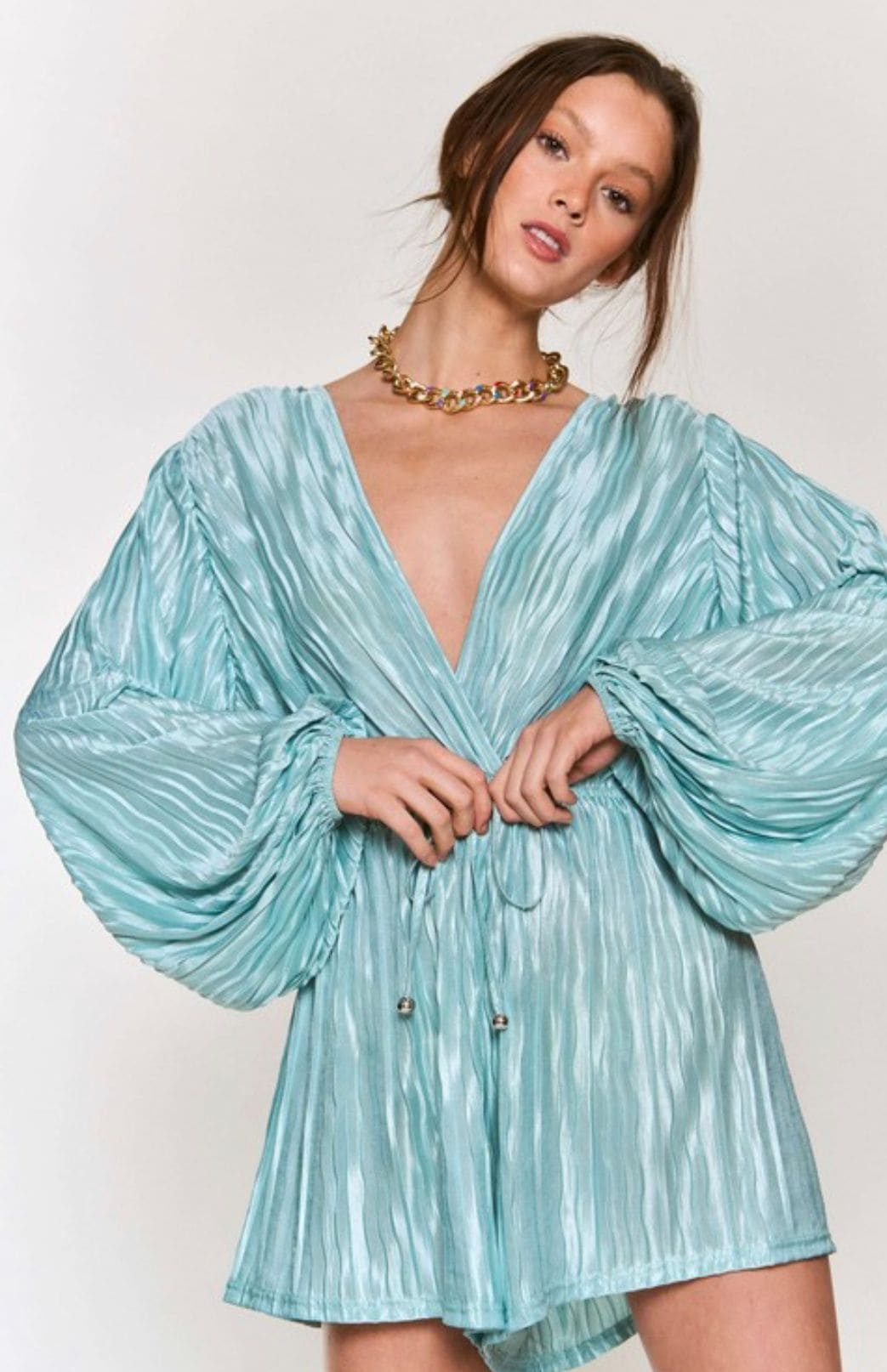 "Minty Fresh: A Satin Rib Long Sleeve Romper for a Chic and Trendy Look"